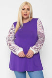 Floral Print, Contrasting Bubble Sleeves Tunic With A Round Neckline.