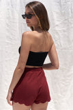 Solid Burgundy Red High Waist Elasticized Waistband Unlined Mini Shorts With Scalloped Bottom Hem